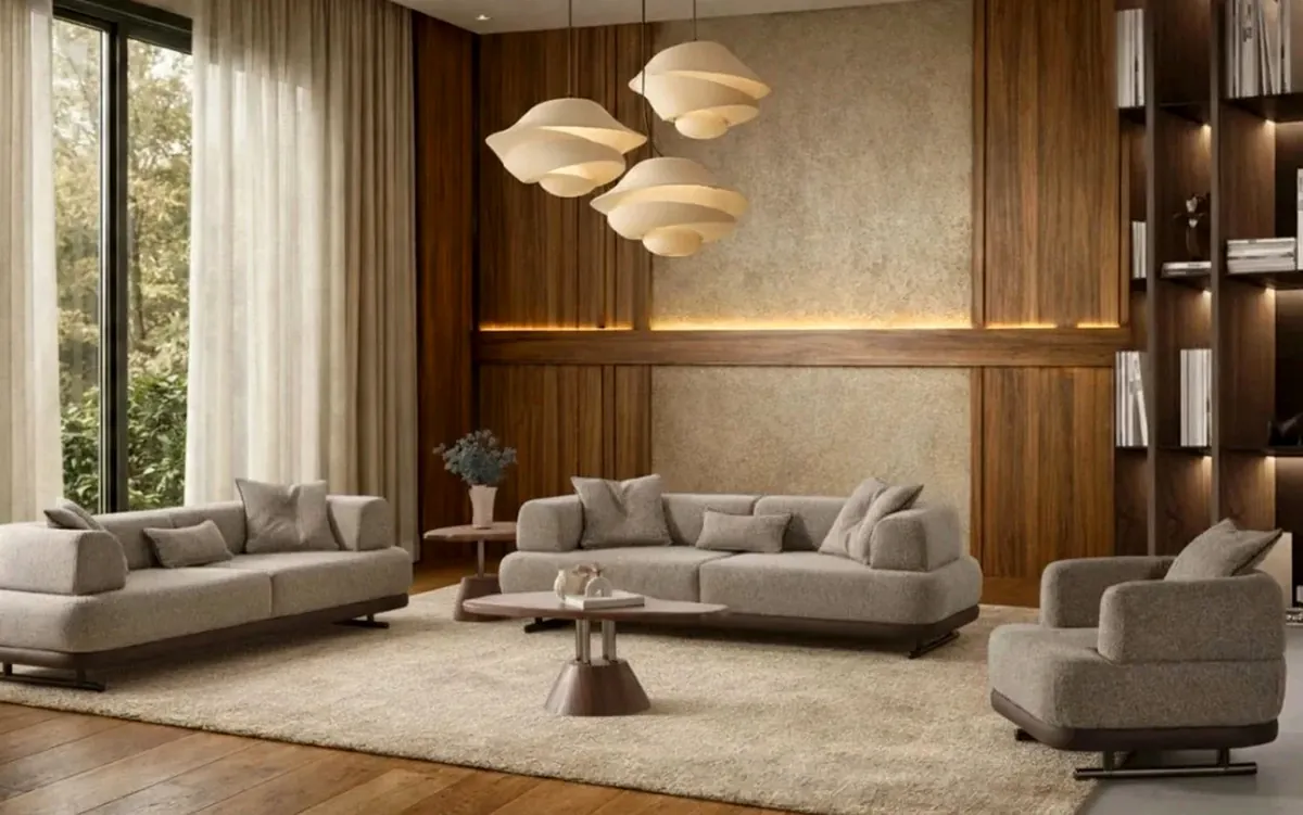 Mass Duru Sofa Set — two greige 3-seater sofas and an armchair in a warm, wood-panelled living room