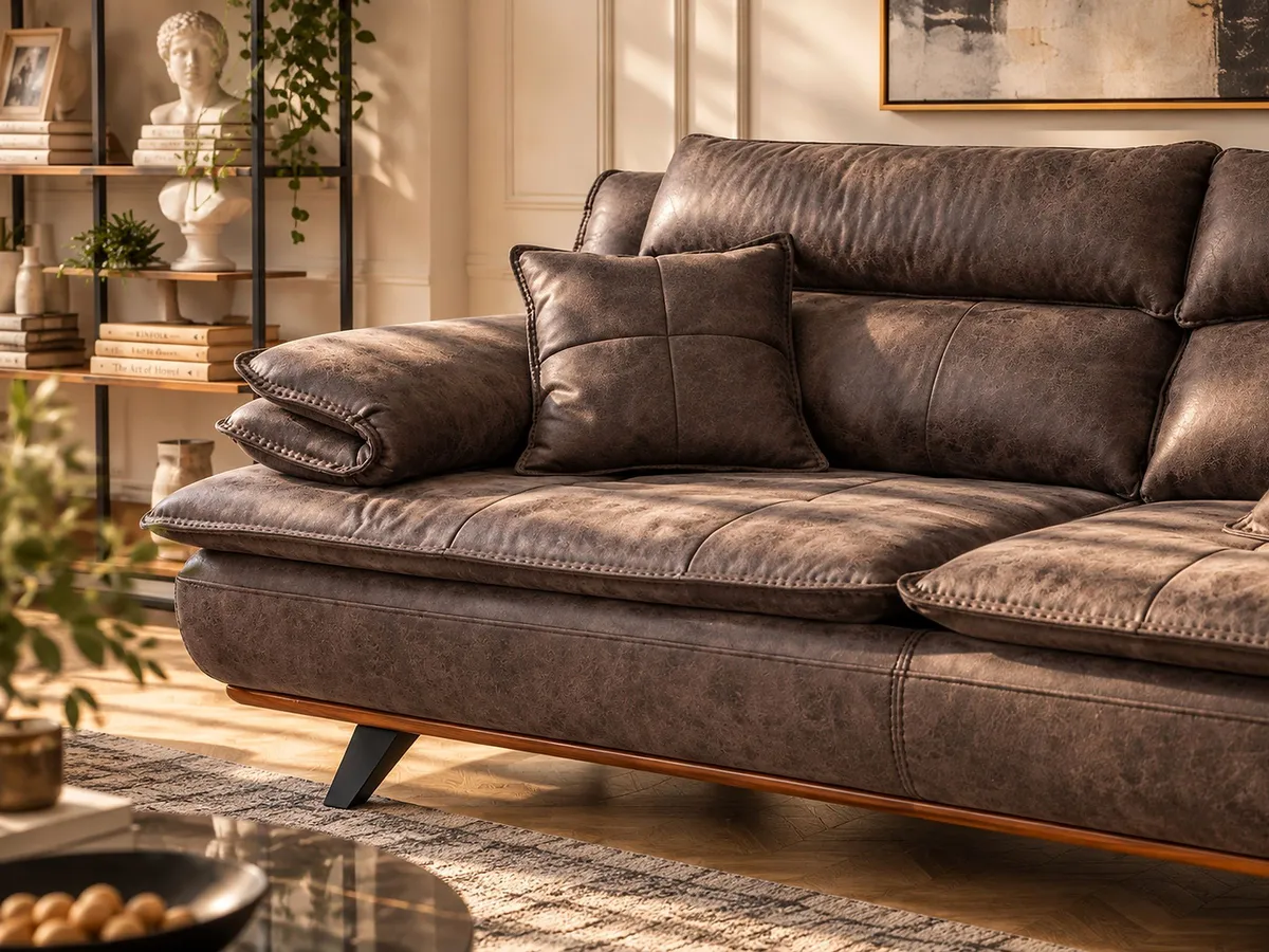 MUSTANG SOFA SET brown fabric sofa with cushions shown in a warm living room setting